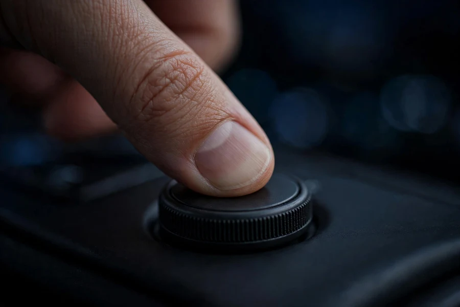 Thumb pressing and holding the volume knob for 30 seconds to reset BMW iDrive