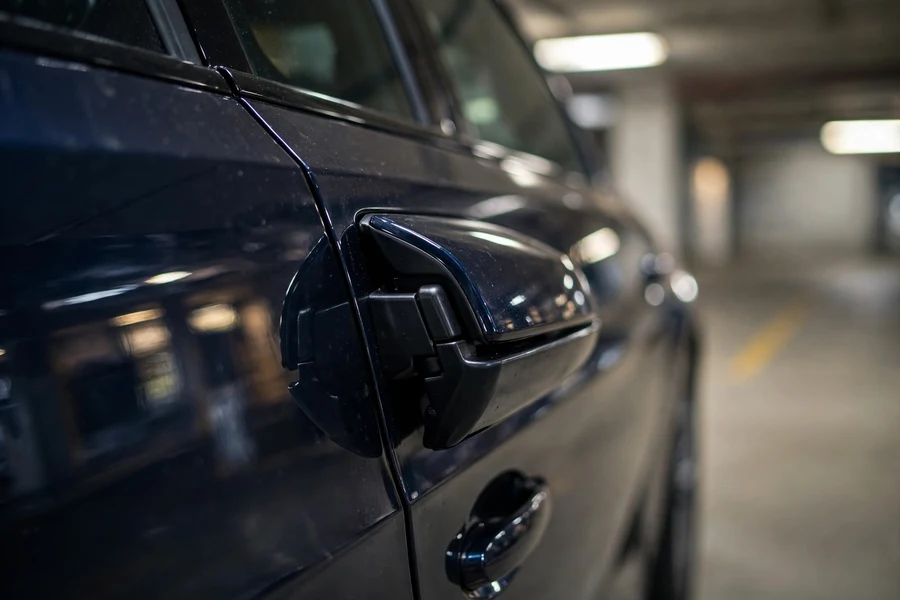 Folded side mirror on a BMW 3 Series — one of the most popular BimmerCode changes