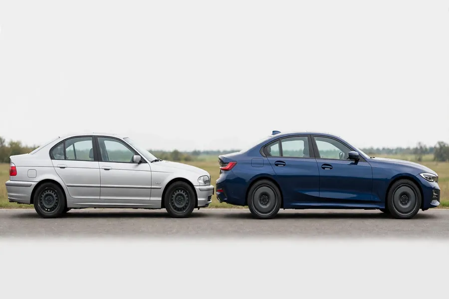 Two BMW 3 Series sedans from consecutive generations parked side by side at a slight angle