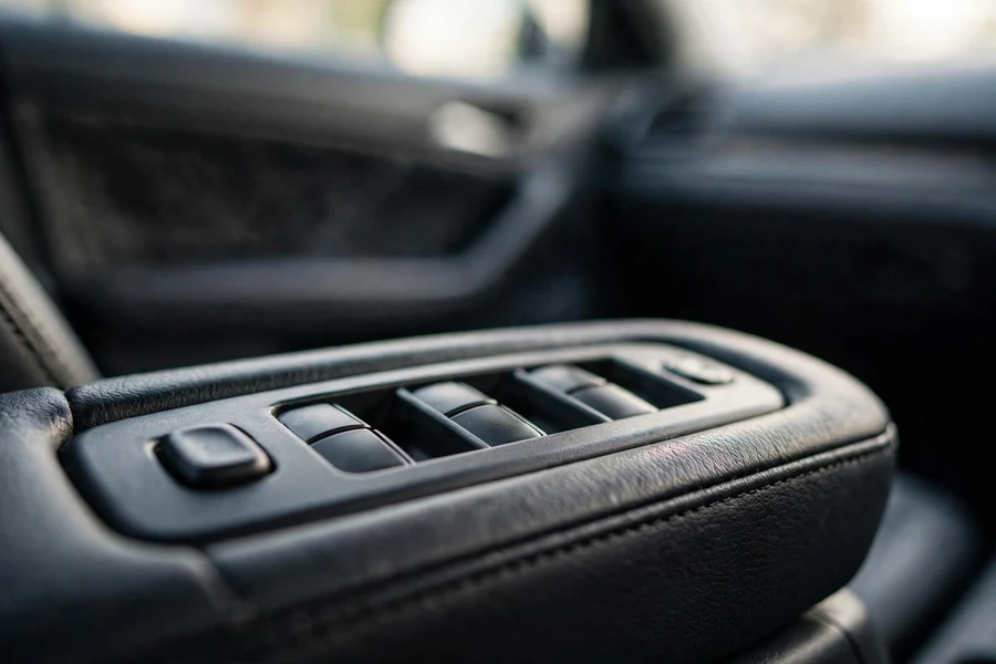 BMW driver-door window switch panel used for the window initialization procedure after regulator replacement