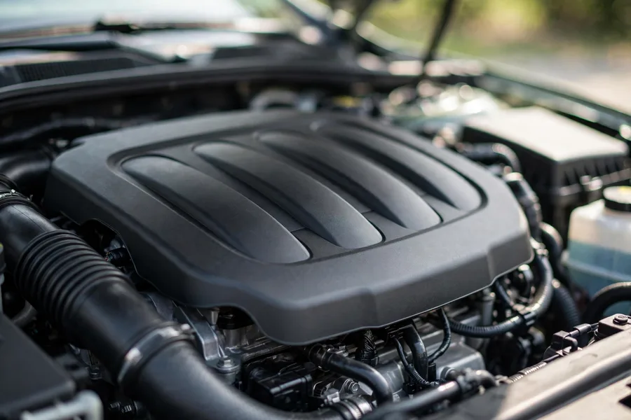 BMW E90 320i engine bay with four-cylinder petrol engine