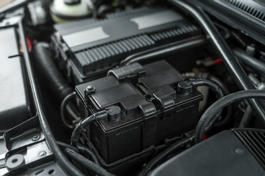 A weak battery corrupts sensor references across several modules at once — always rule out voltage early.