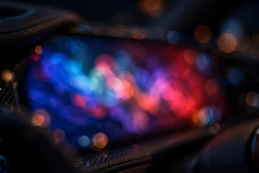 Abstract glow of a car infotainment display at night